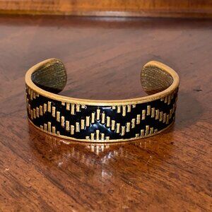 LOFT cuff bracelet with black and gold chevron pattern